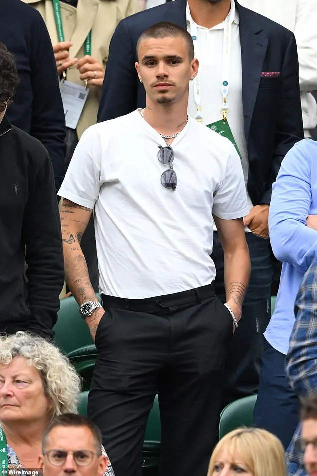 The middle son of Victoria and David Beckham opted for a casual white t-shirt at the prestigious event