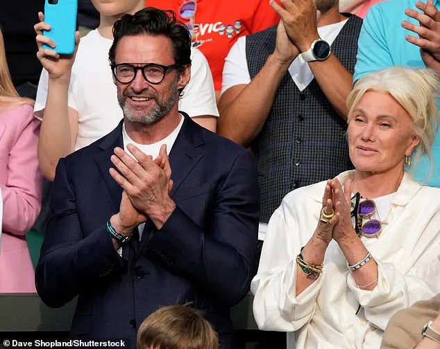 Hugh Jackman (L) applauded Carlos Alcaraz alongside wife Deborra-Lee Furness(L) while dressed in a smart navy blazer