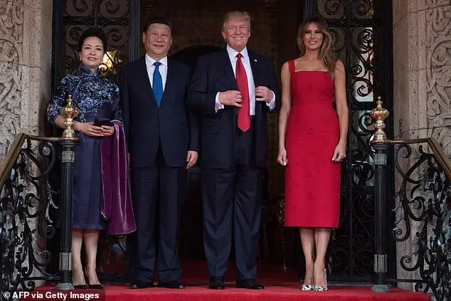 Melania rewore a red Valentino dress she originally wore in April 2017 when she and then-President Trump hosted Chinese President Xi Jinping (2nd left) and his wife Peng Liyuan (left) at Mar-a-Lago