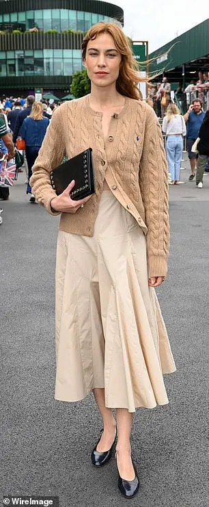 Alexa Chung showed off her impeccable style in a brown knitted cardigan and midi skirt