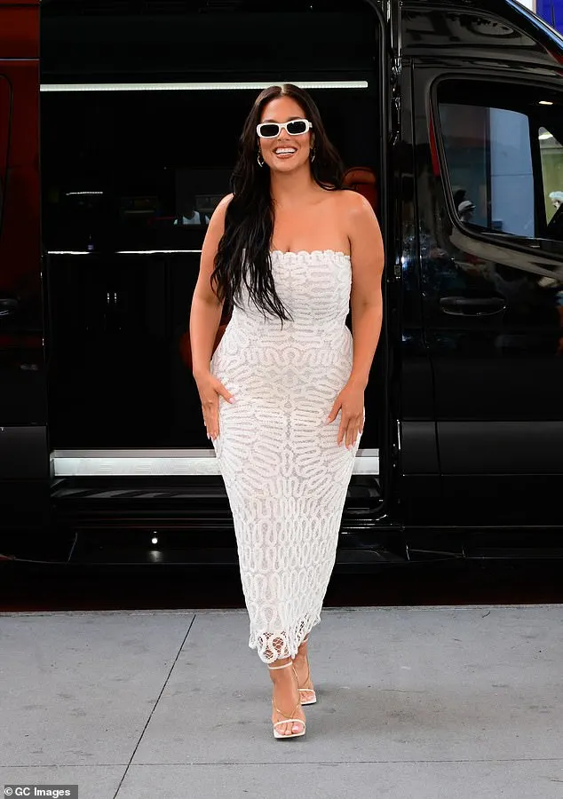 Ashley Graham cut a sophisticated figure in a white lace dress while doing an in-store event for Ulta Beauty as a St. Tropez ambassador on Wednesday