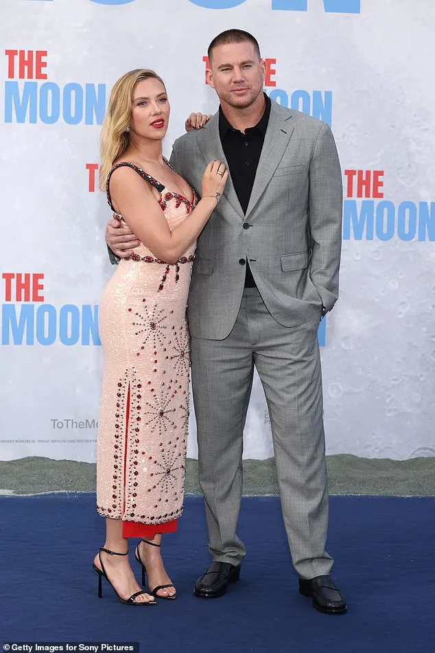 Scarlett Johansson cut a glamorous figure as she posed alongside her co-star Channing Tatum at the German premiere of To The Moon in Berlin on Wednesday