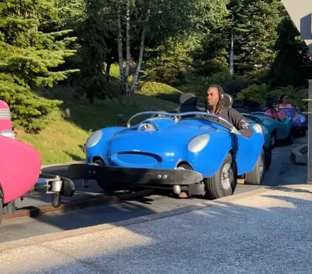 Cardi B also filmed the music artist sitting in a blue car next to their son Wave as they had a blast on another ride