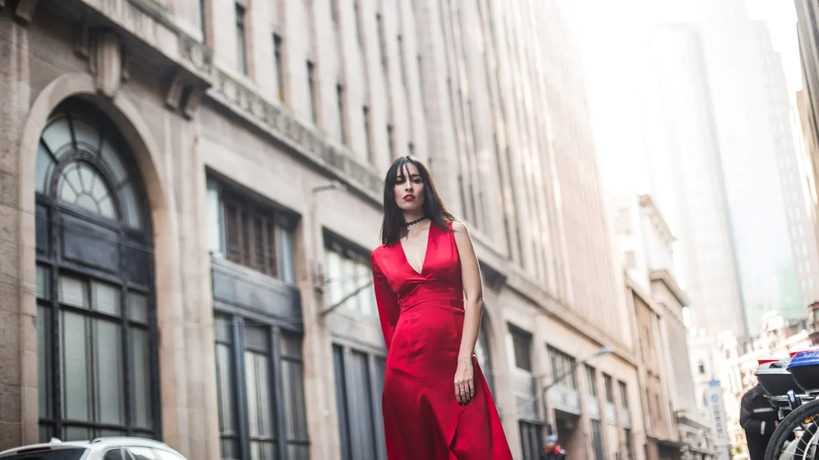 Beautiful woman walking down the city street