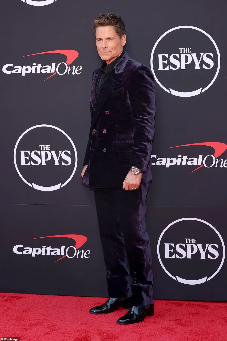 Rob Lowe wore an intriguing purple crushed velvet suit, but he missed an opportunity to lighten the dark look up by wearing a black shirt