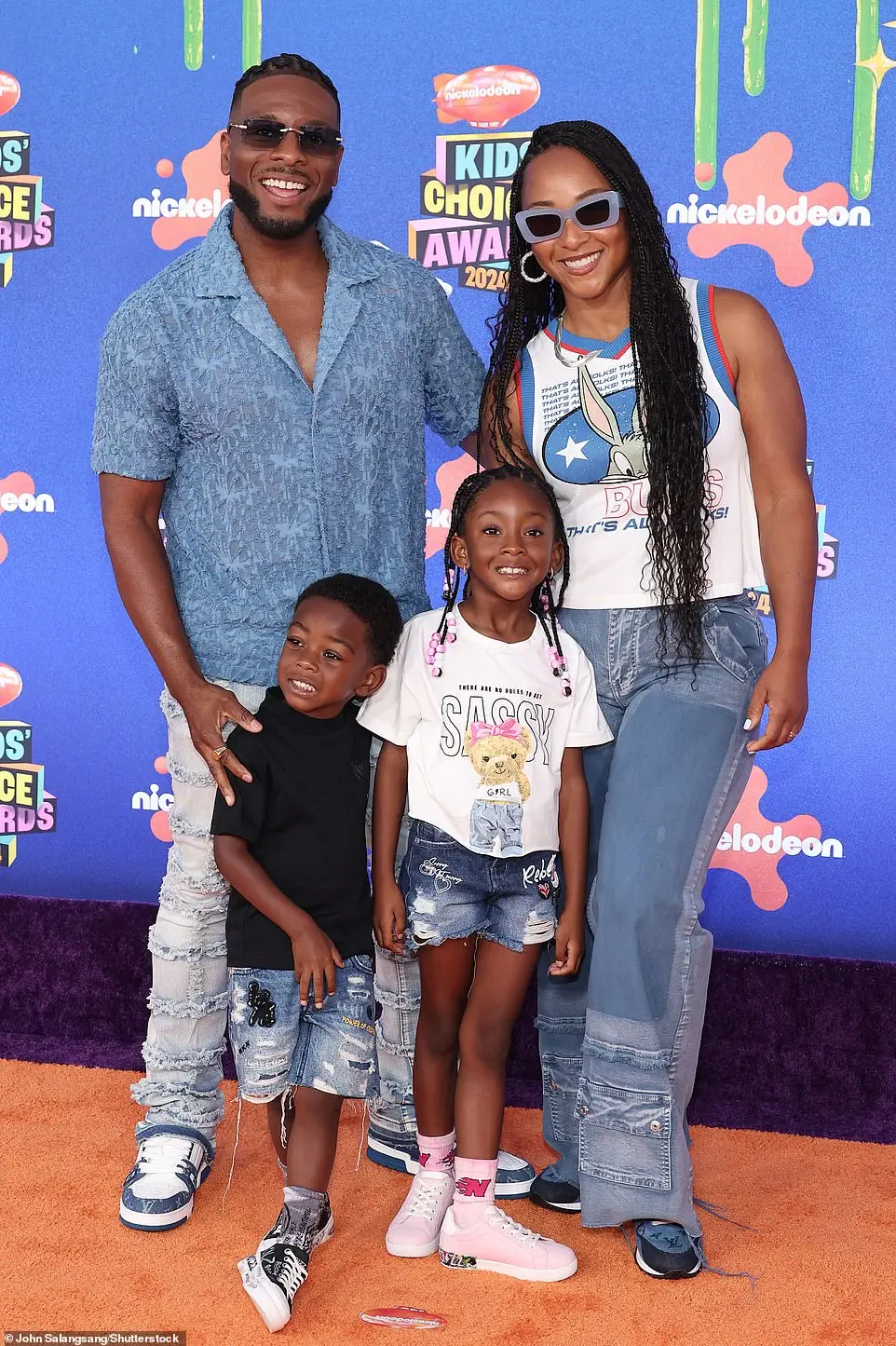 Mitchell - who is also known for starring alongside Kenan Thompson in the series Kenan & Kel - was also joined by wife, Asia Lee, whom he tied the knot with in 2012. Their two children also paused for a sweet family photo on the red carpet