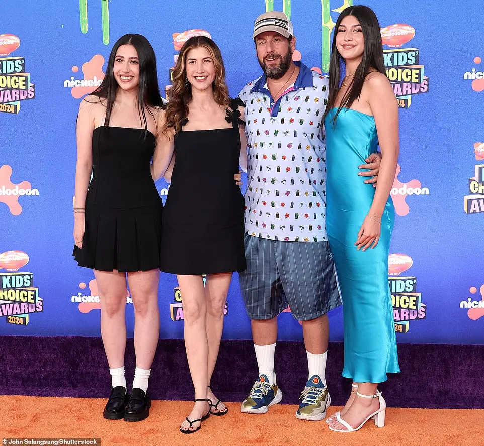 The Happy Gilmore star added a tan cap on top of his head and was accompanied by wife, Jackie, as well as daughters Sadie and Sunny