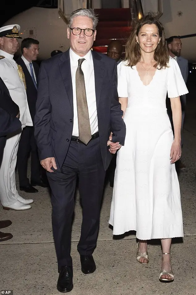 Lady Starmer wears an elegant white dress while in Washington DC with her husband Sir Keir