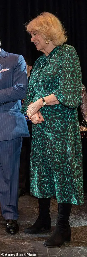 Camilla, then the Duchess of Cornwall, wears Cefinn's shibori print as she unveils a plaque during a visit to the Irish Cultural Centre, London, in 2022