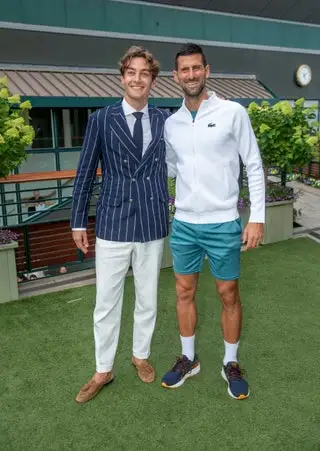 Image may contain Novak Djokovic Clothing Footwear Shoe Person Standing Adult Accessories Formal Wear and Tie