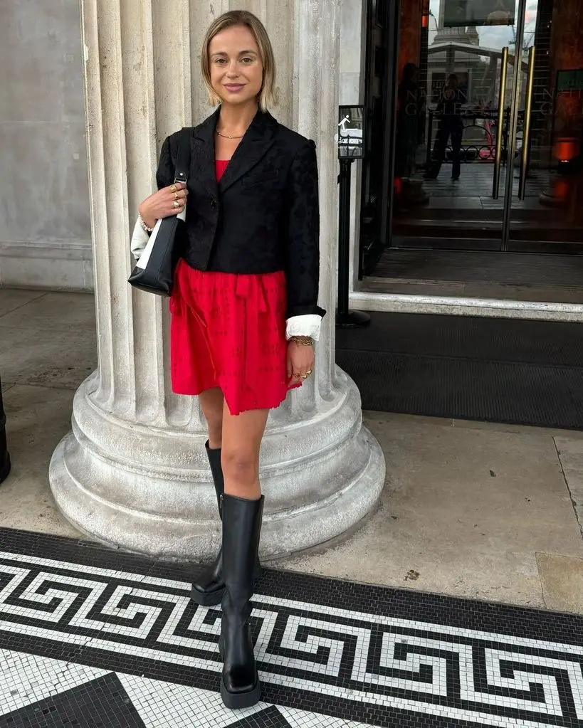 Lady Amelia Windsor in a red mini dress and knee-high boots