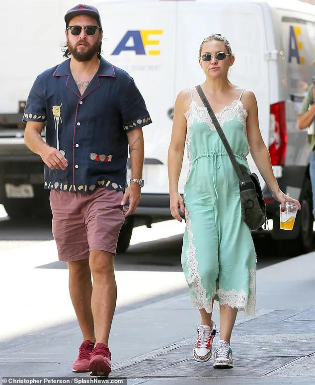 The Almost Famous made her way through the bustling streets of the Big Apple with the musician as they stopped by Yves Saint Laurent in Soho