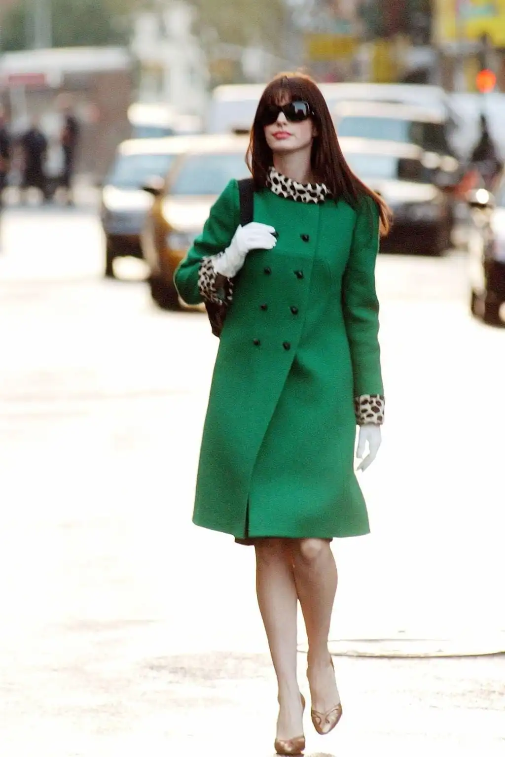 A strong green coat with cheetah printing is a wise fashionable choice.