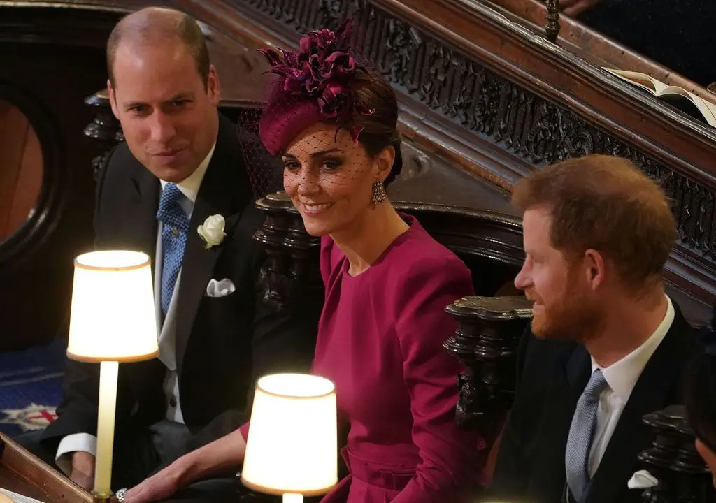 Kate rests her arm on William's leg at Eugenie and Jack's wedding