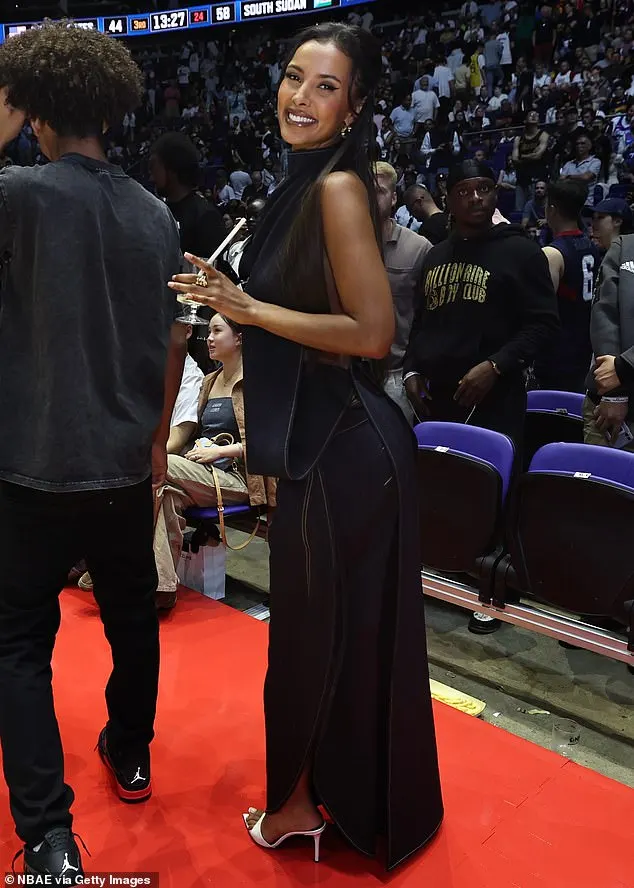 Maya Jama looked incredible in a figure-hugging denim dress as she attended the USA Basketball Showcase with her family in London on Saturday