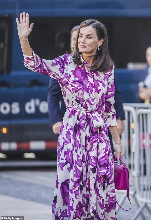 The Spanish Queen waved to crowds outside Barcelona City Hall, as she chaired the event