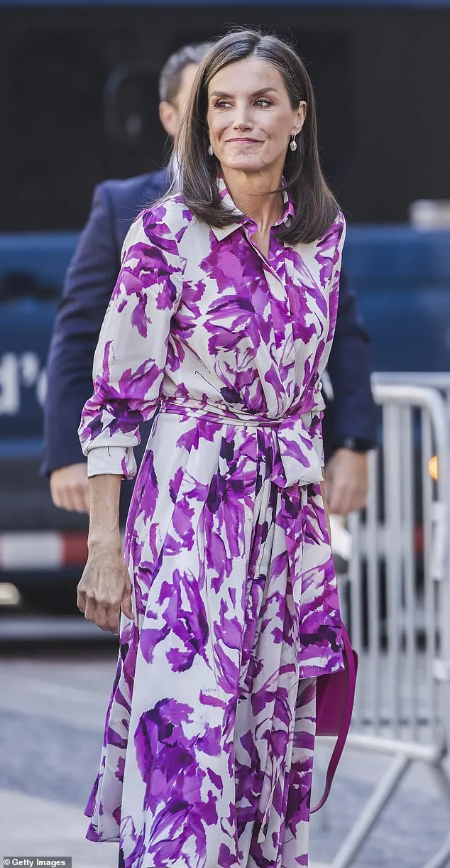 She added a matching fuchsia bag from Carolina Herrera, giving pops of colour throughout her look