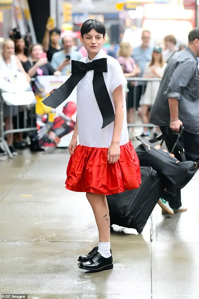 Emma, who has promoting their villainous role in the Marvel blockbuster Deadpool & Wolverine, made a bold statement in the white loose-fitting dress with a red trim