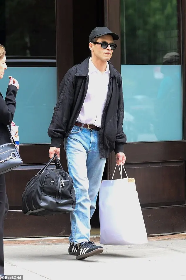 Rami also showed off his laid-back sense of style as he departed his hotel