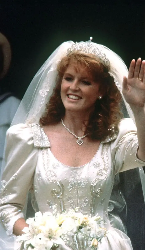 Sarah Ferguson in wedding dress waving