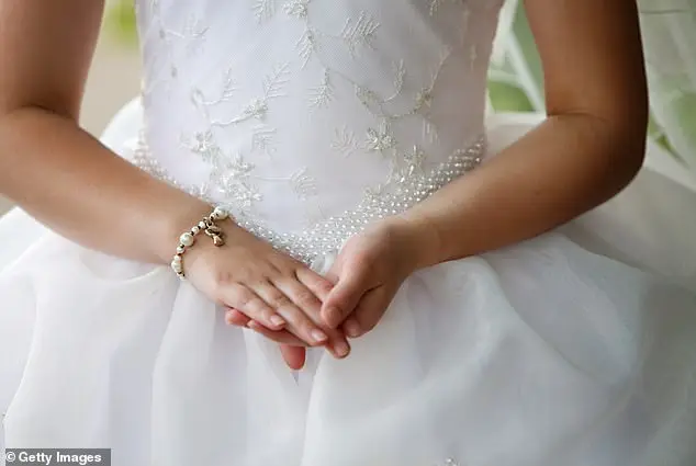 A mother who chose to dress her five year old daughter in a white dress has sent a bride into a jealous rage - with the whole wedding being called off