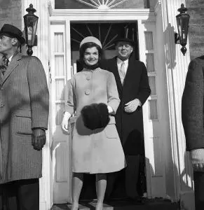 (Original Caption) Headed For the White House. Washington, D.C.: John F. Kennedy, wearing top hat, and his wife, Jacqueline, leave their Georgetown home for the White House, where they had coffee with President Eisenhower prior to inauguration ceremonies.