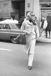 Jacqueline Kennedy Onassis crossing the street in a head scarf and sunglasses after a big day of shopping at Bonwit' on November 30, 1970 in New York..Article title: 'Eye (Photo by Fairchild Archive/Penske Media via Getty Images)