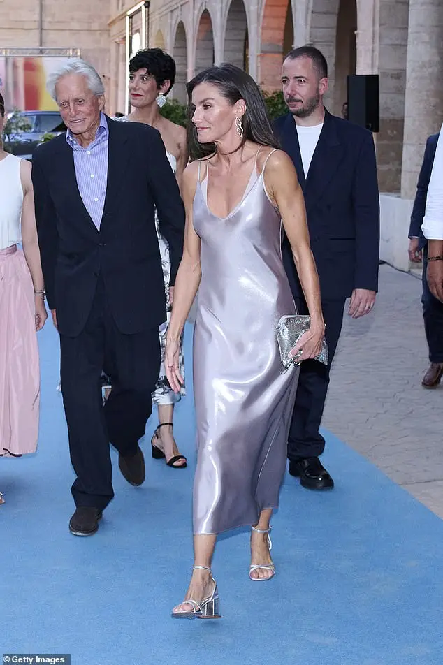 Letizia and Michael walked on the blue carpet laid out as they attended the film festival on Sunday