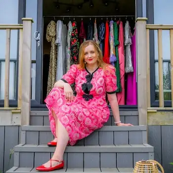 Paula Pimlott sitting on a staircase