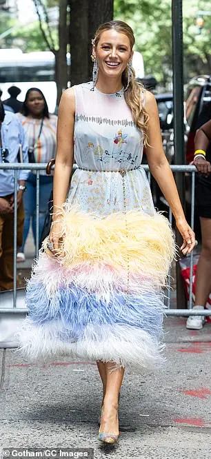 Later, Blake changed into a sheer baby-blue dress featuring four pastel shades of Ostrich feathers at the skirt and colorful pumps