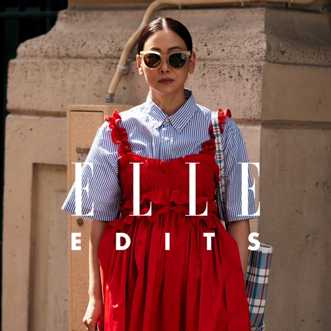 a person wearing a red and blue dress and sunglasses