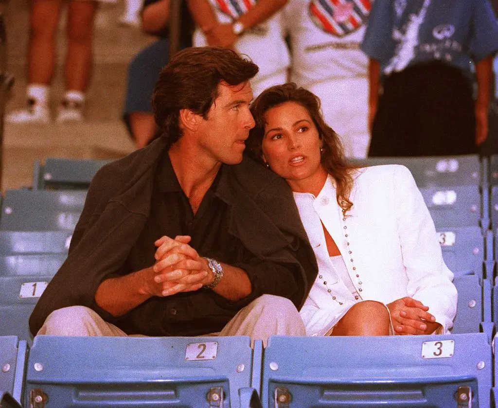 Actor Pierce Brosnan and his girlfriend Keely Shaye Smith at the Infiniti Tennis Tournament in Westwood, CA.