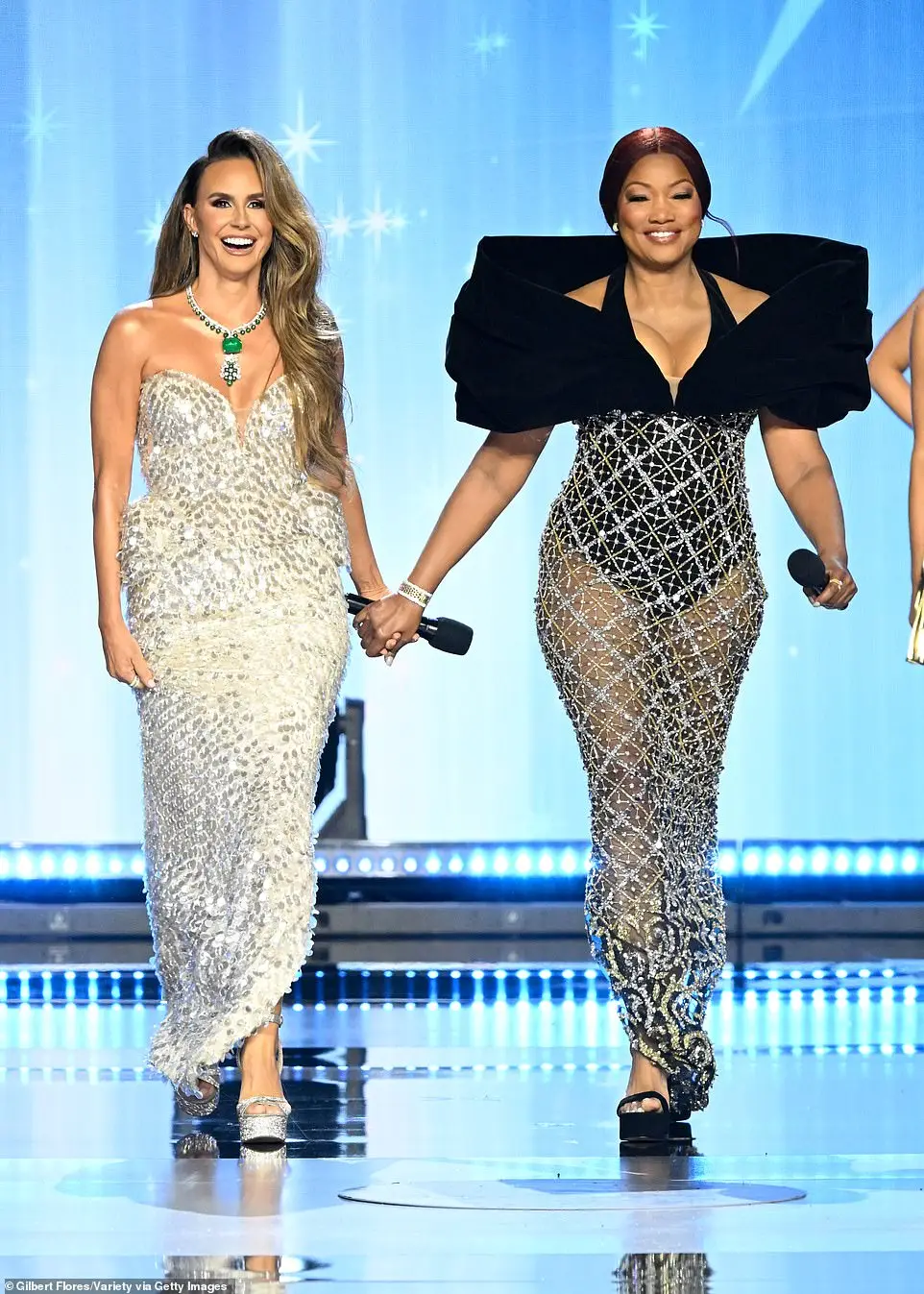 The Real Housewives of Beverly Hills star co-hosted Miss USA 2024 alongside Entertainment Tonight's Keltie Knight (L)