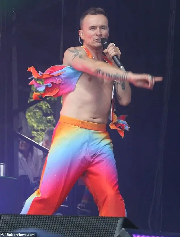 The remaining members performed their hits to the crowd with Jon (pictured) opting for an open shirt that showed of his tattoo collection.