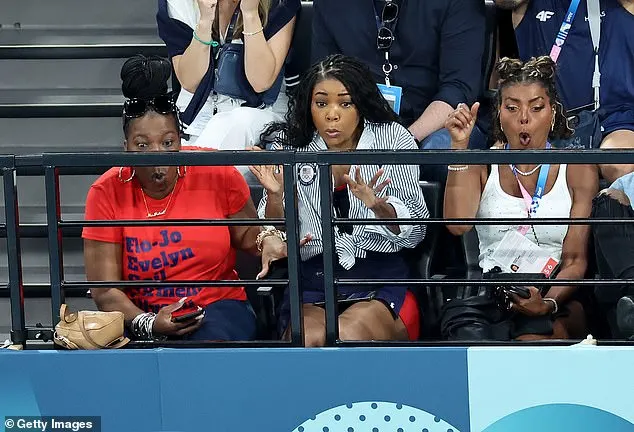 Something on the main floor appeared to have captured their attention as they watched intently. The 2024 Paris Olympics officially started on July 26th and will end on August 11th