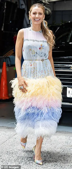 The star seemed to be a fan of New York designer Dauphinette as she stepped out in a blue and yellow dress which boasted a dramatic feathered skirt