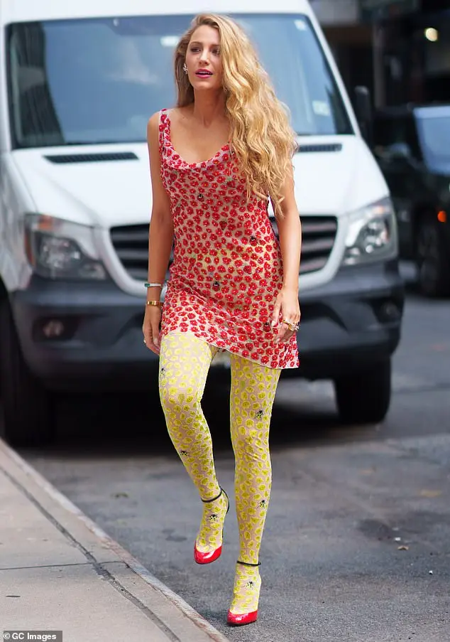 Blake turned heads as she stepped out in a red sleeveless minidress which she teamed with eye catching yellow floral tights