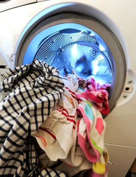 Washing machine with laundry.