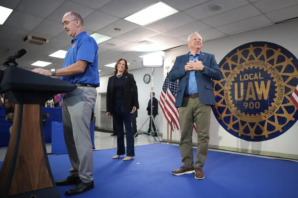 Democratic vice presidential candidate Minnesota Gov. Tim Walz seen wearing Oxford boots from Cole Haan Grand Atlantic at a campaign rally in Wayne, Michigan