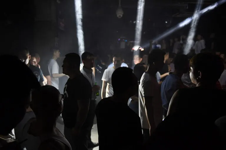 People dance in a gay night club in Beijing, May 11, 2019. While homosexuality was decriminalized in China in 1997, Xi Jinping has ushered in a conservative attitude towards sexuality. (Greg Baker/AFP)