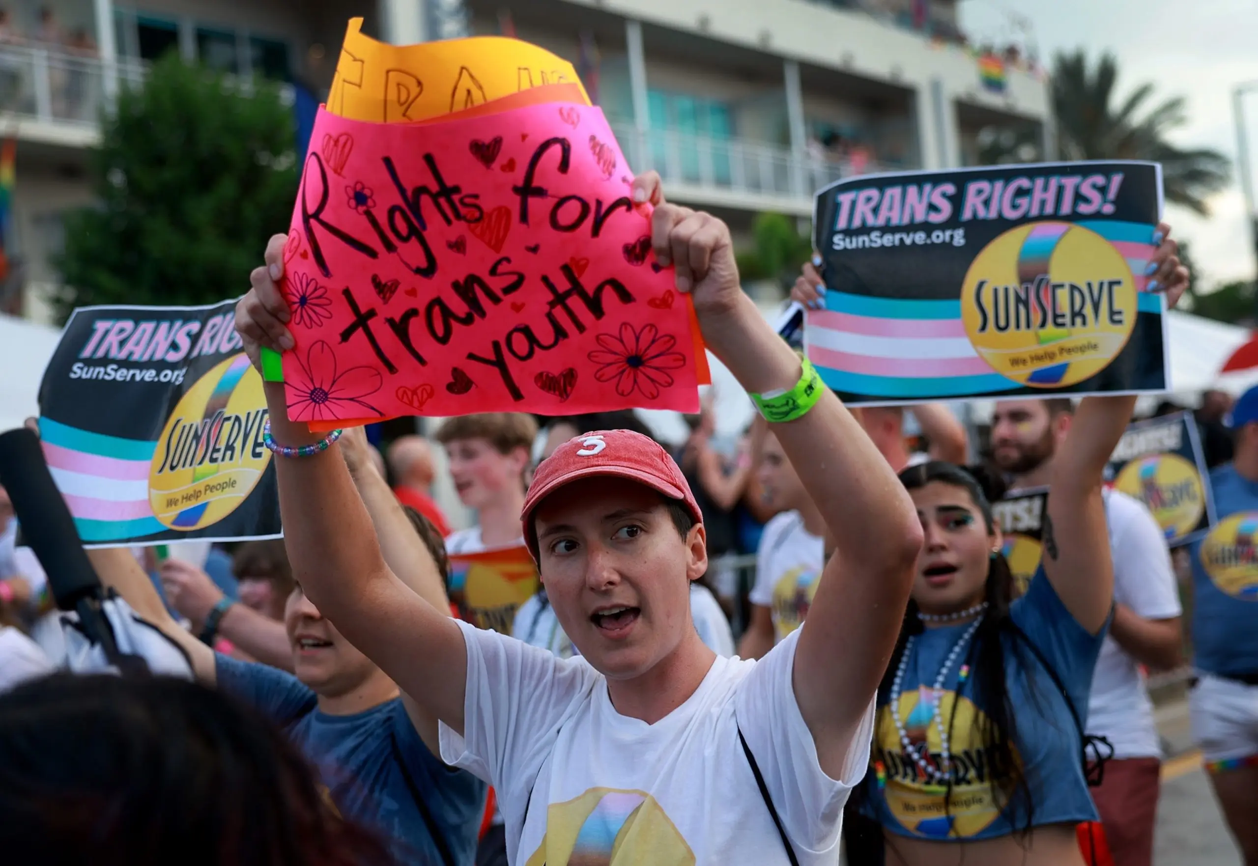 PHOTO: In this June 17, 2023 file photo, people protesting against Florida Gov. Ron DeSantis and Florida lawmakers that passed anti-LGBTQ laws, walk in the Stonewall Pride parade in Wilton Manors, Fla.