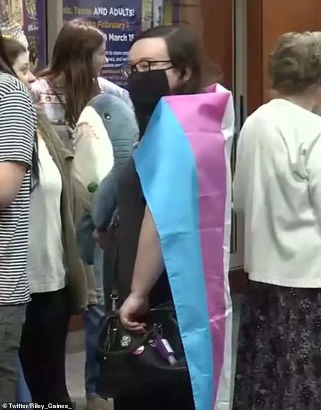 An activist draped in a transgender pride flag and holding a shark interrupted the Brave Books Story Hour held by swimmer Riley Gaines and surfer Bethany Hamilton on Friday