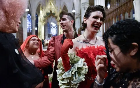 Pews were packed with mourners, many transgender, who cheered as they were led in prayers for transgender rights and access to sex-change surgery