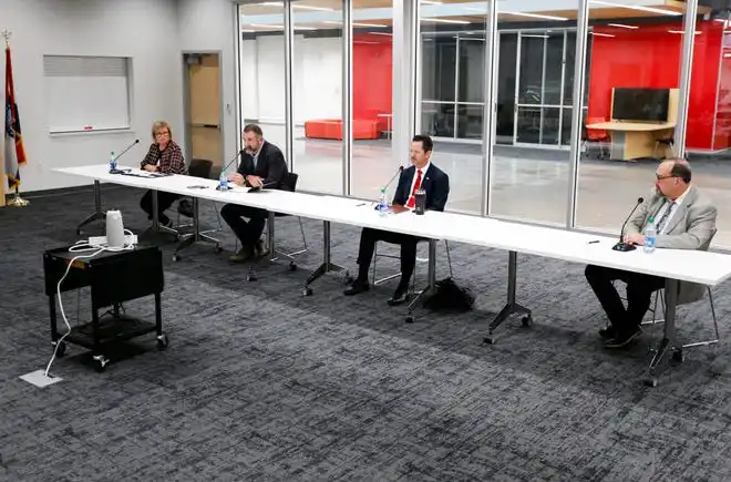 Ozark School Board candidates Patty Quessenberry, Dustin Kirkman, James Griffin and Jason Shaffer answer questions at a forum put on by the Ozark PTA on Tuesday, March 19, 2024.