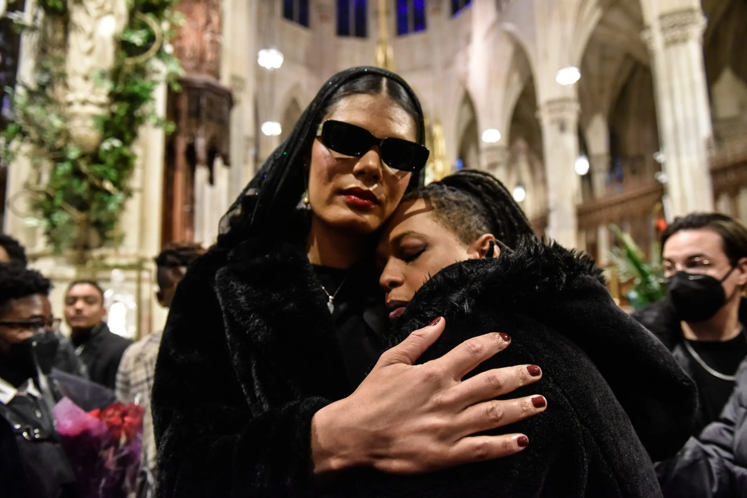 PHOTO: People attend the funeral of transgender community activist Cecilia Gentili at St. Patrick's Cathedral on February 15, 2024 in New York City.