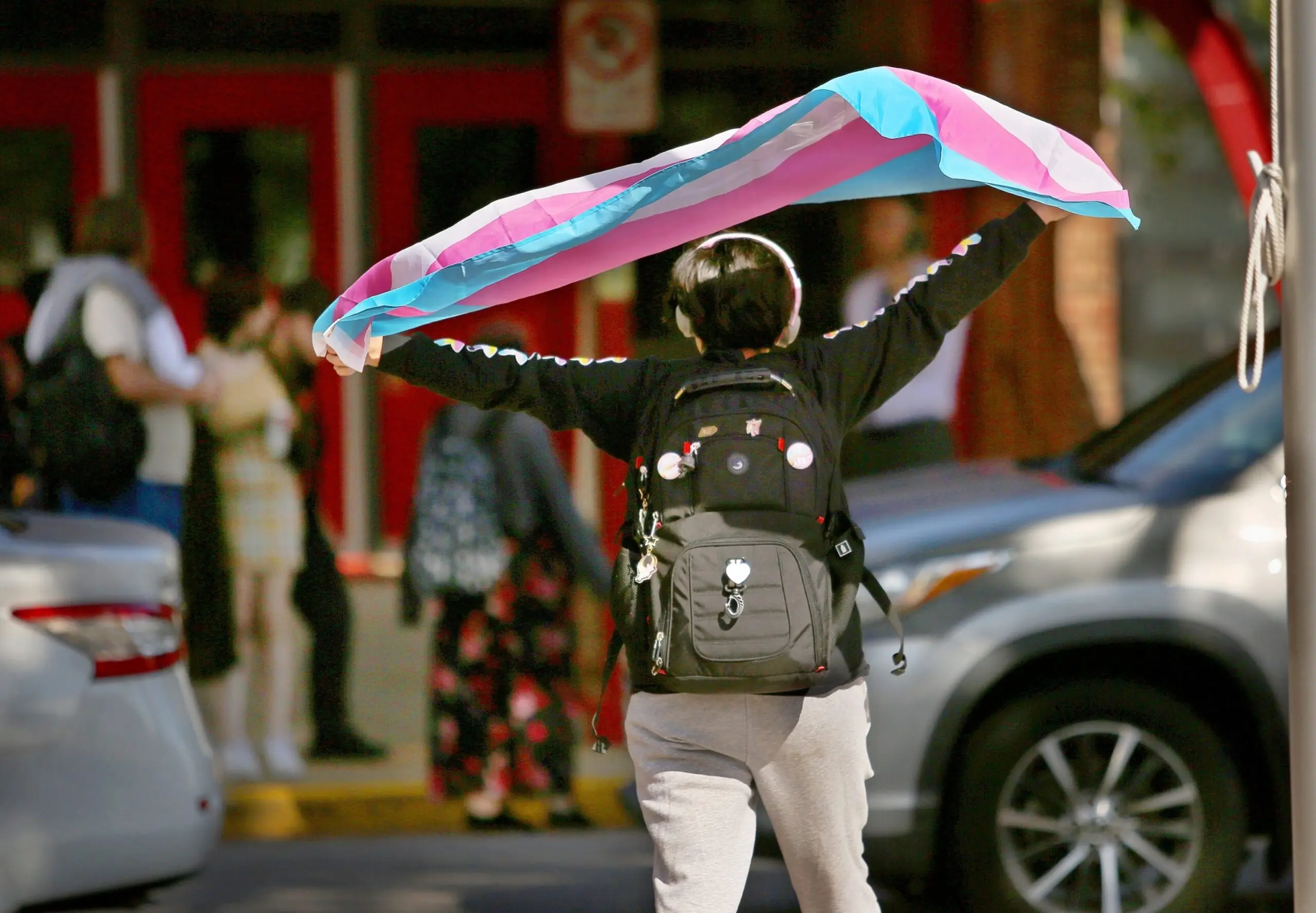 PHOTO: A Bayside High School student protests the governor's new transgender policies in front of the school on Feb. 13, 2024, in Virginia Beach, Virginia.