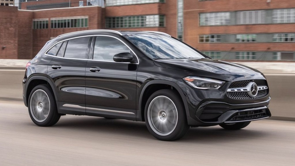 Black Mercedes-Benz GLA-Class parked near a building. This is one of the luxury cars to avoid.