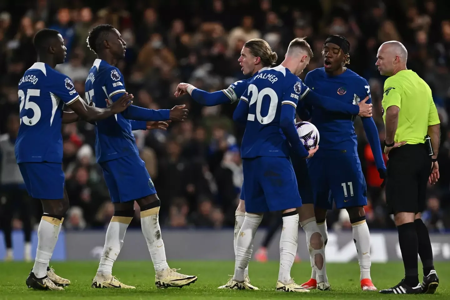 Palmer and Madueke were involved in a heated discussion before the former netted his spot kick (Getty)