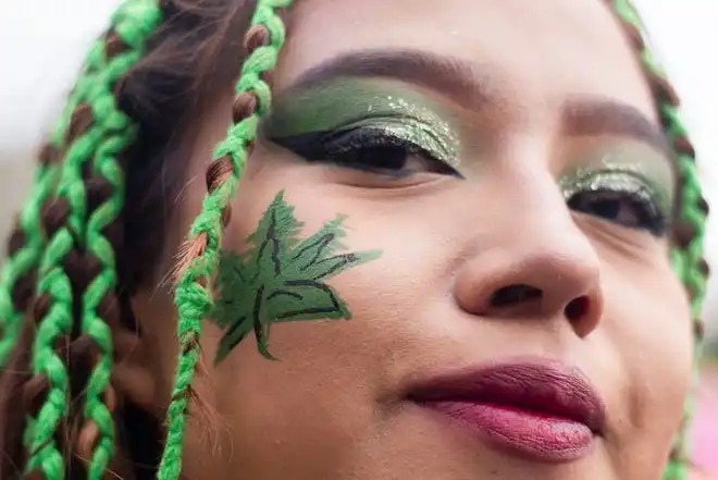 A person takes part in the informal annual cannabis holiday, 4/20, corresponding to the numerical figure widely recognized within the cannabis subculture as a symbol for all things related to marijuana, in Mexico City, Mexico, April 20, 2023.