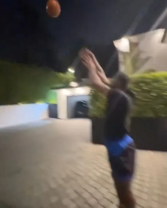 James showed off perfect form from deep in a backyard at night